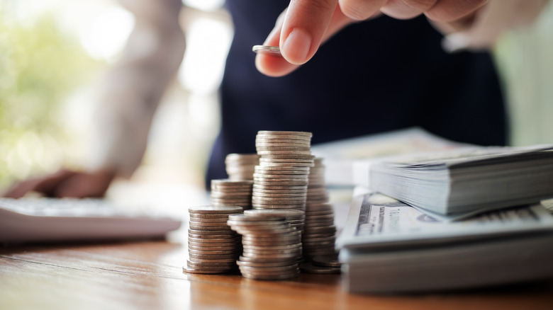 Picture of person stacking coins