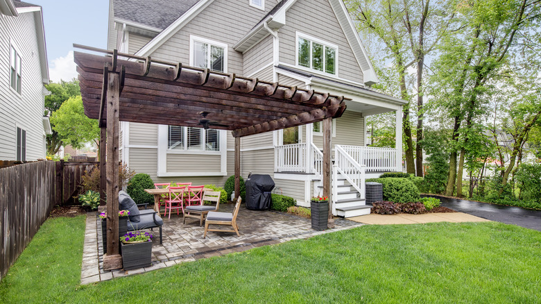 wood pergola in backyard