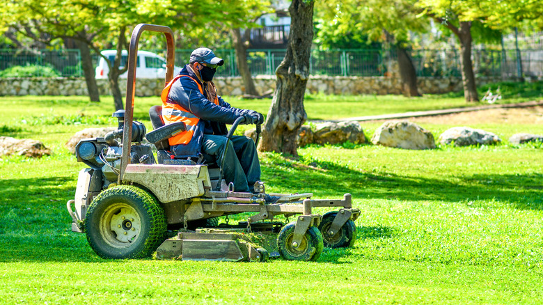 Professional using lawn mower