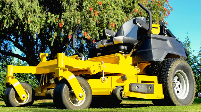 Yellow zero turn lawn mower