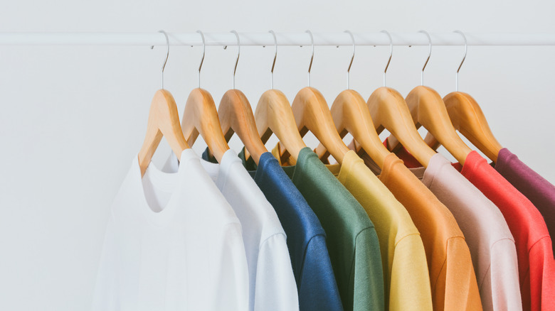 colored shirts on hangars