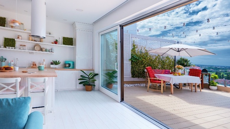 Kitchen open to an outdoor deck