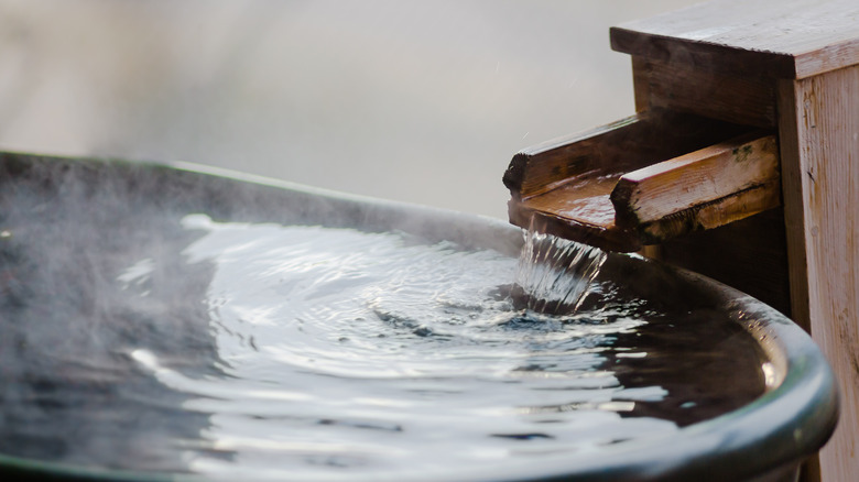 hot water flowing into tub