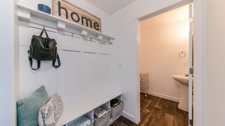 mudroom with attached bathroom