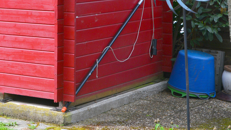 a red, wooden shed