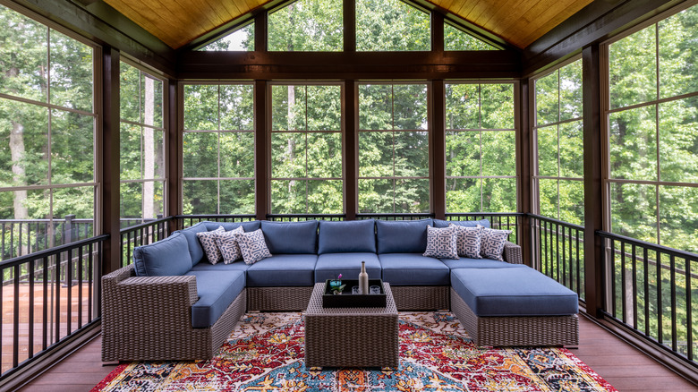 sunroom with sectional sofa