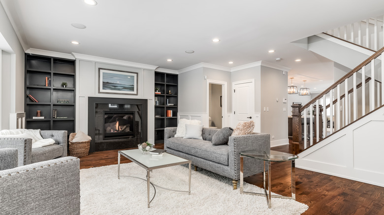 built-in shelving around a fireplace