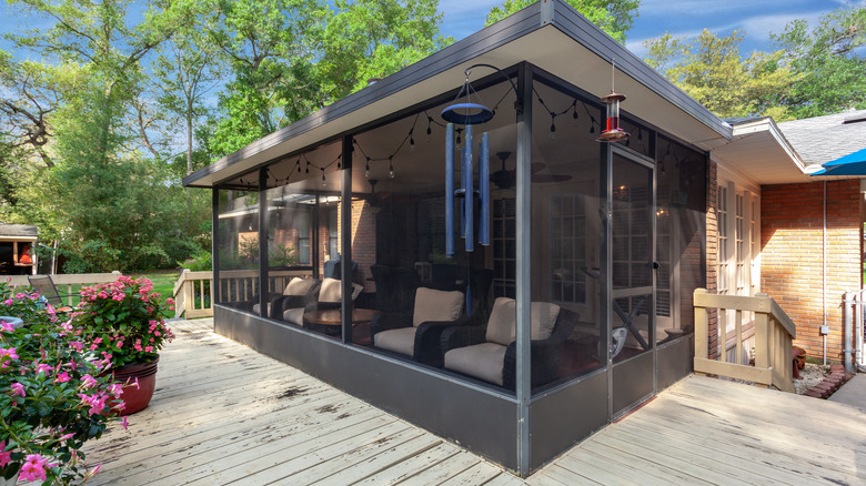 enclosed patio and wooden deck