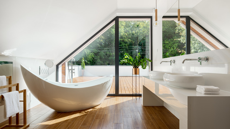 Modern attic bathroom with balcony