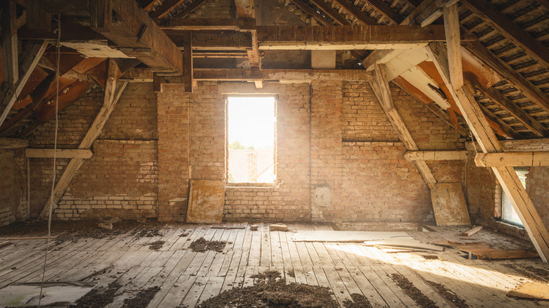 Unfinished, brick-walled attic