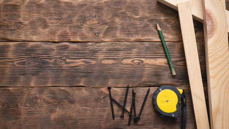 Wood fence with tools