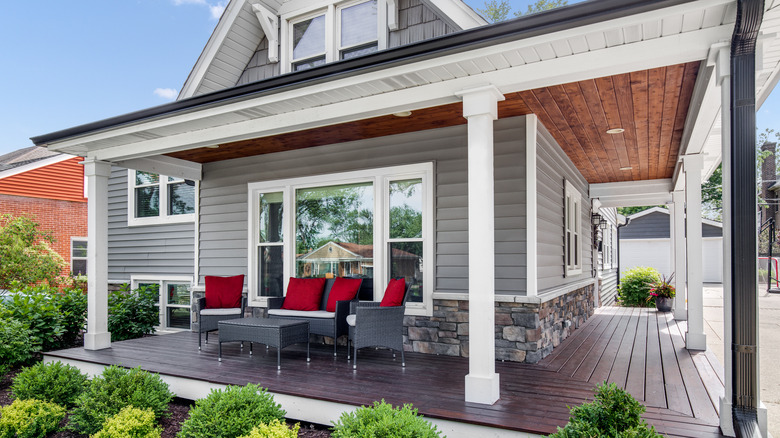 Grey painted house with white trim