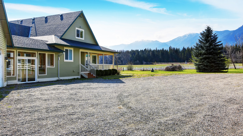 house with gravel driveway