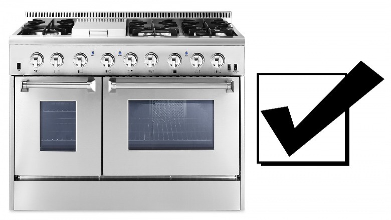 Stainless steel double oven with check mark