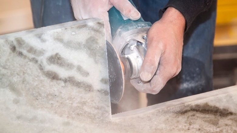 Man cutting marble 