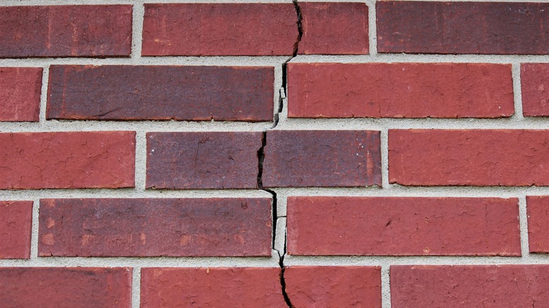 cracks in a brick wall