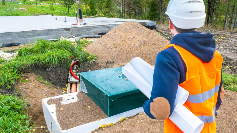 inspecting a septic tank