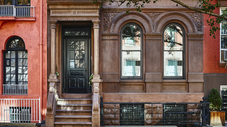 brownstone home with windows