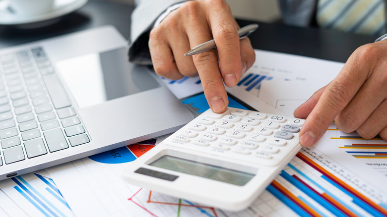 Person calculating on a calculator