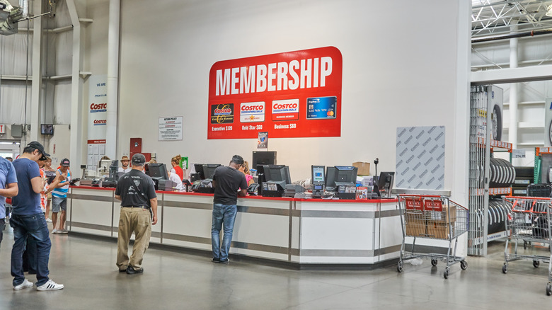 Customers at Costco membership counter