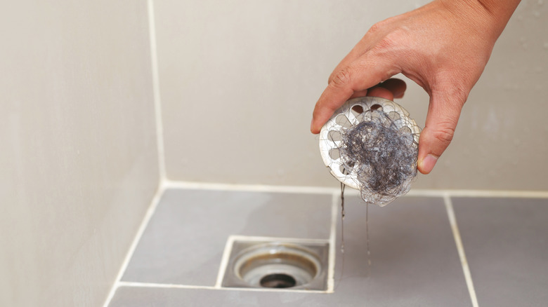 removing shower drain cover