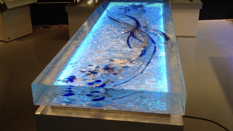 blue painted and illuminated glass countertop