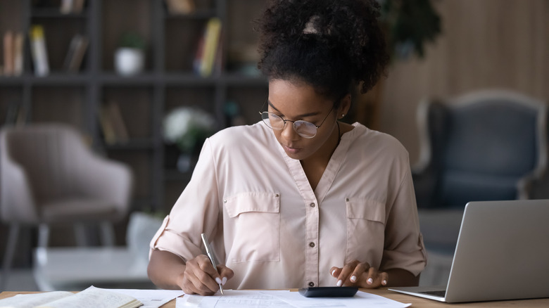 Young lady working on budget