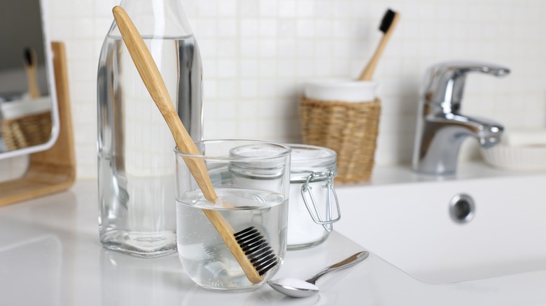 toothbrush being cleaned