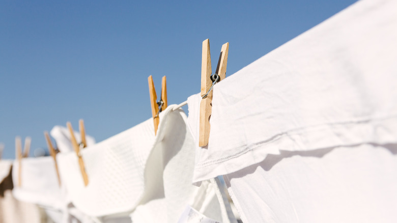 White linens hanging to dry