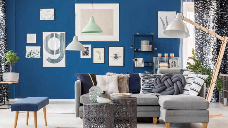 Blue living room gallery wall