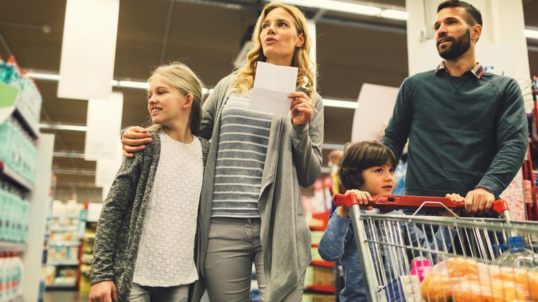 Family shopping for household goods