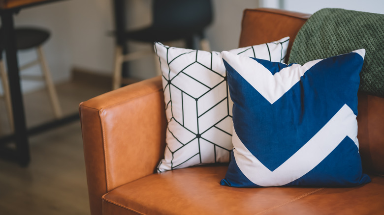 patterned accent pillows on couch