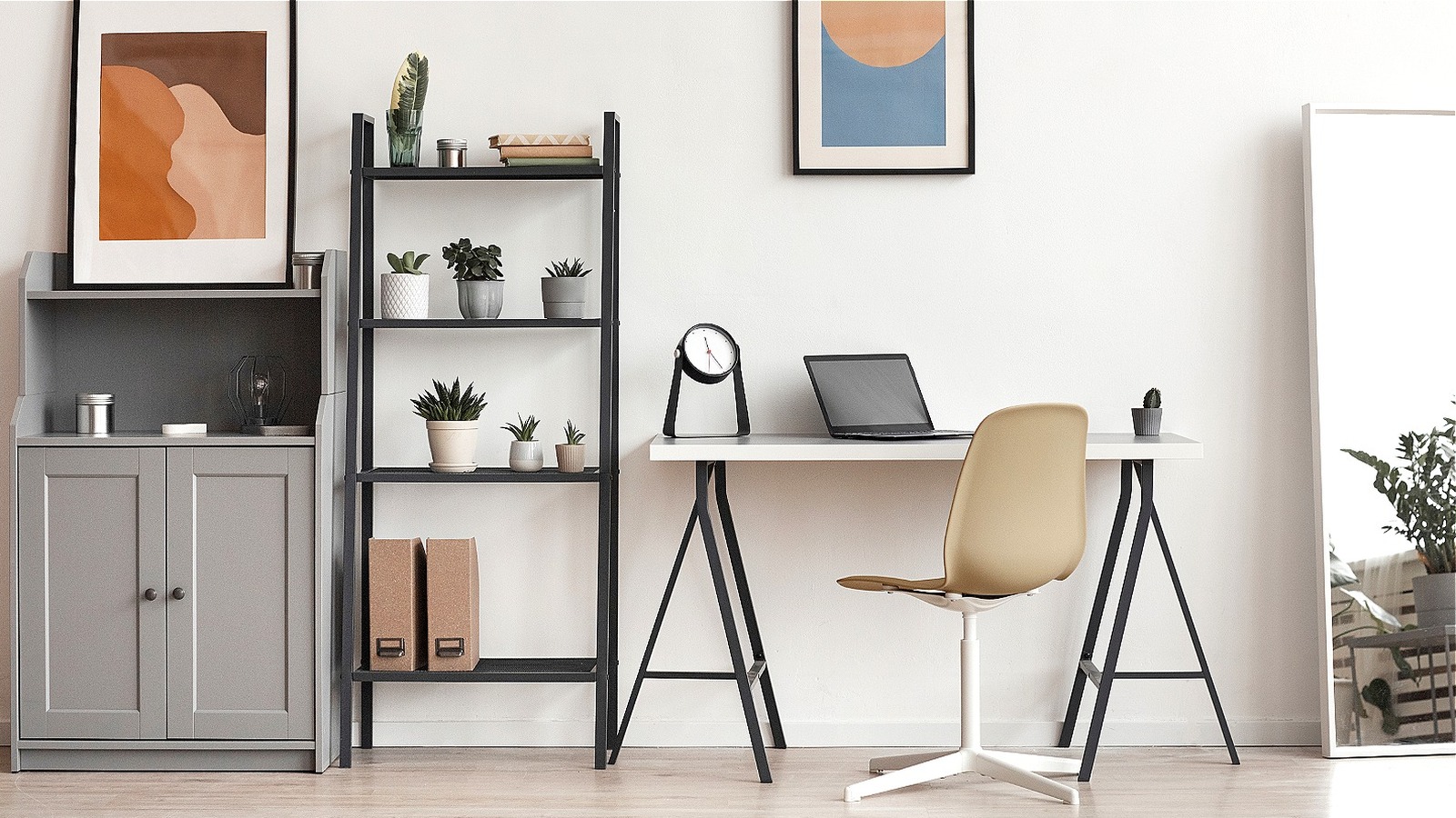 https://www.housedigest.com/img/gallery/how-the-right-color-desk-can-add-good-feng-shui-to-your-home-office/l-intro-1678037091.jpg