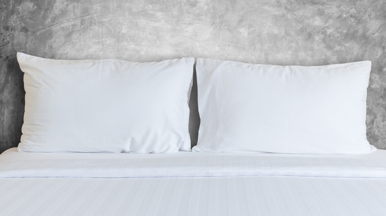 Smooth white bed sheets