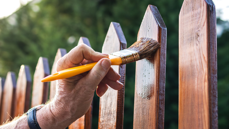 staining wood fence dark color