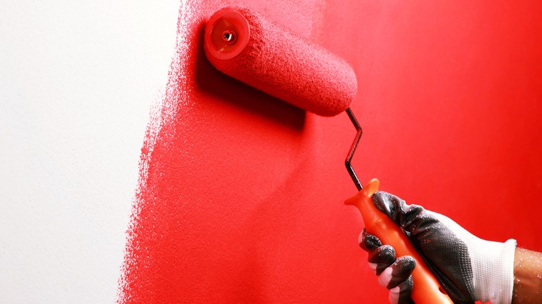 Red paint and paint roller