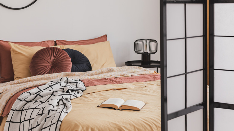 two round pillows on bed