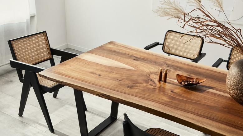 Wooden dining table with chairs