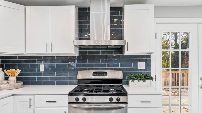 navy blue tile backsplash in kitchen 