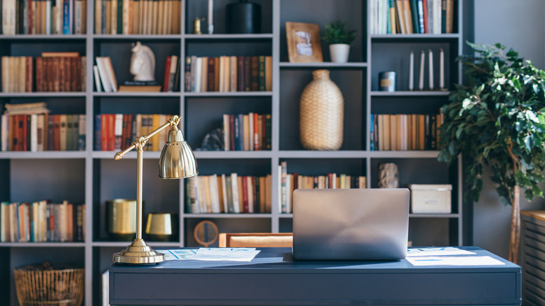 home office with desk and laptop