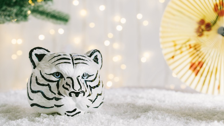 tiger head decor on white floor