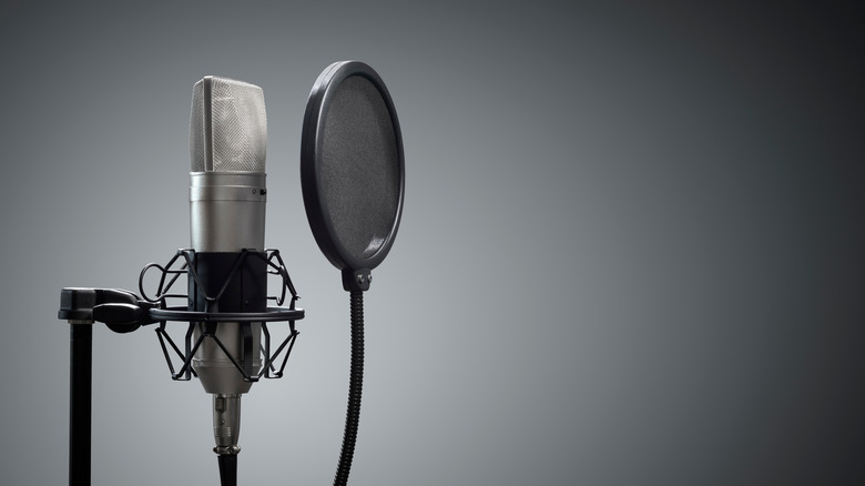 Studio microphone with pop shield