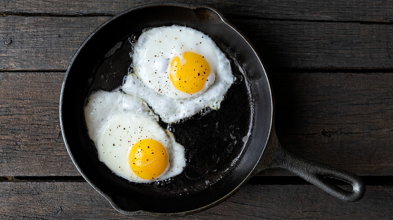 fried eggs in cast iron skillet