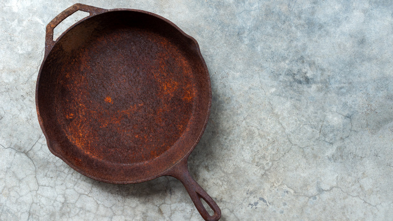 rusty cast iron pan