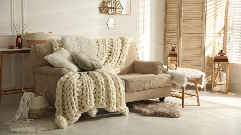 neutral living room with blankets
