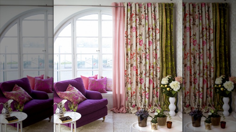 a colorful living room, with purple armchair and three different-colored/patterned curtains