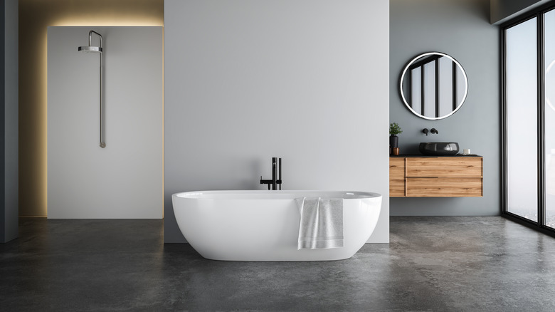 modern bathroom with polished concrete floor