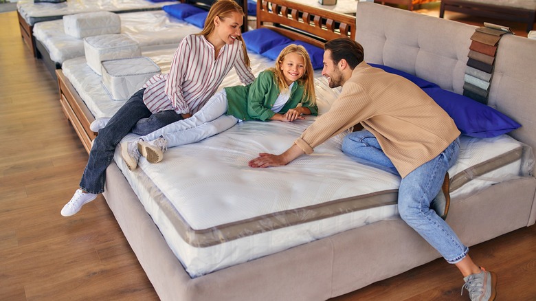 Family at a mattress store