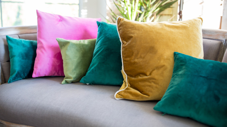 velvet throw pillows on sofa