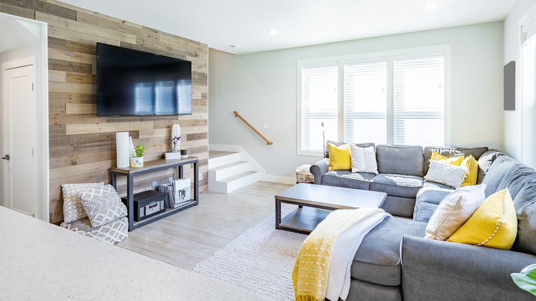 living room with wood paneling